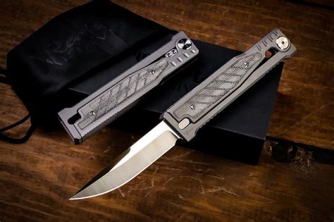 By pinching the handle scales and dropping the frame at an angle, you can easily slide the blade in and out with nothing but gravity. . Drop point gravity knife